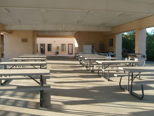 Covered picnic area by the pool
