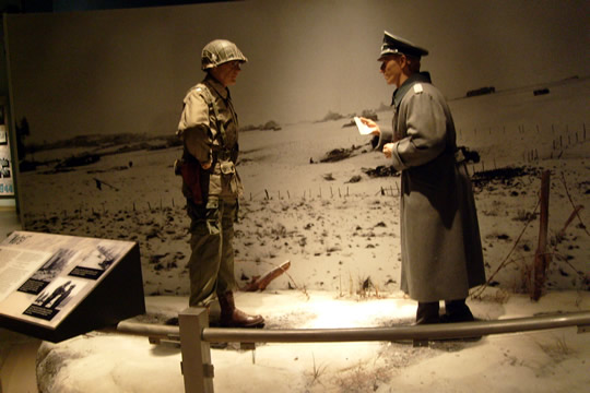 Germans ordering Americaon forces at Bastogne to surrender
The Germans sent a message to the American General in command ordering surrender in 2 hours during the Battle of the Bulge or he would start artillery fire again and annihilate them.

