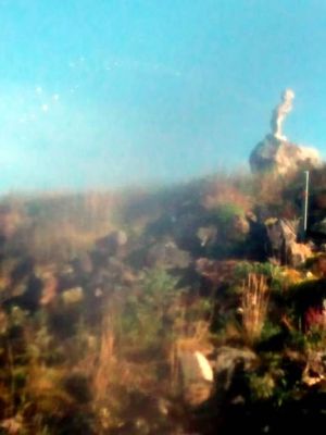 Little boy statue peeing in river or is that another "Piss on Ford" sticker?
