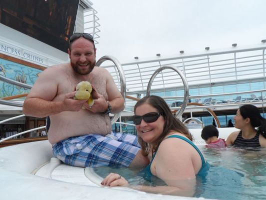 George enjoys the hot tub with new friends
