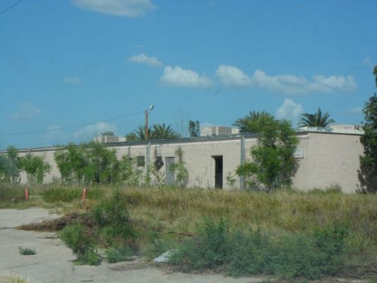 Old Asherton, TX High School
Later additions perhaps. There is also a radio tower and huge old style satellite dish.
