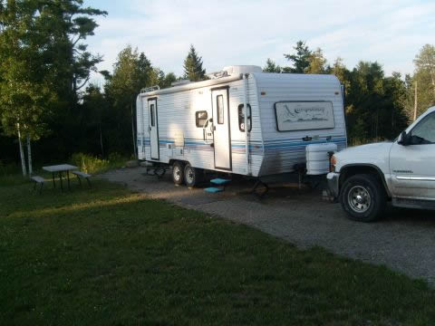 My campsite at The Pumpkin Patch RV Resort
My kind of camping; open, gravel driveway, grassy, nice new plastic composition picnic table.
