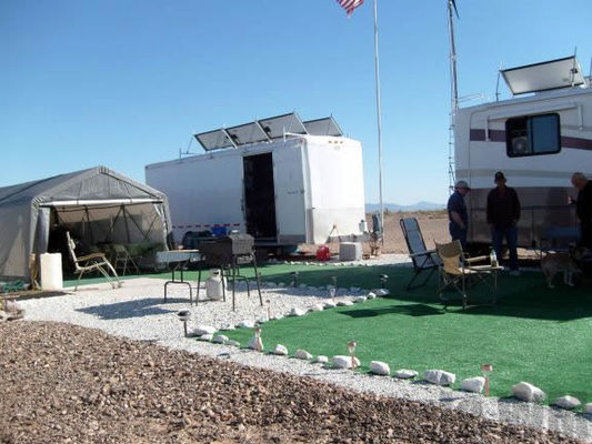 Creating an oasis on the desert
White trailer on left houses battery banks and additional solar panels
