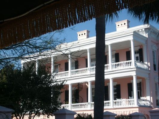 The piaza
Most houses are designed to catch the breeze from the harbor in the afternoon out on the piaza where ladies might be found in their undergarments rocking on the piaza to cool off. Charleston has a very strict peeping tom law. Just acknowledging a lady's presence on her piaza might land a gentleman in jail.
