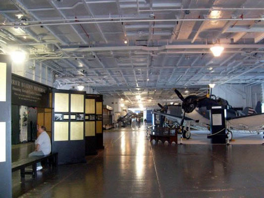 Hangar deck
The aircraft lifts have been removed but the hangar deck is very cool with planes on display, one plane you can sit in the cockpit, the Medal of Honor Museum, Apollo 8, and huge roll up doors everywhere to provide a nice breeze and ocean view not to mention loading cargo.

