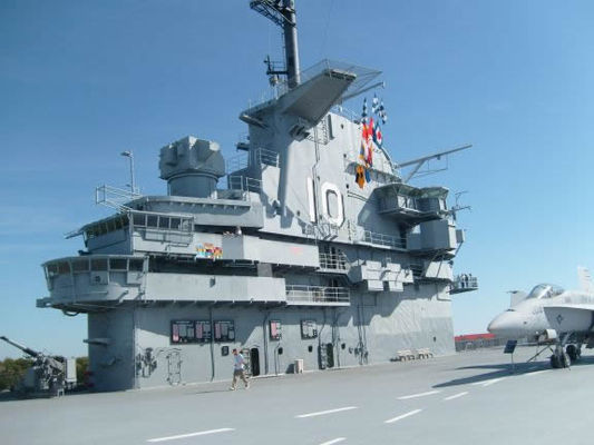 The island
Used to direct operations, it contains the primary flight control, bridge, flag bridge, and quarters for the Captain and First Officer in there to use during operations.
