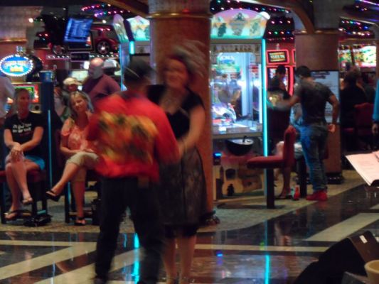 Cruise Director Jen dancing with a guest
