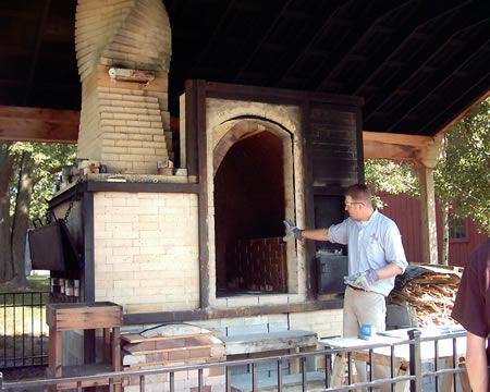The pottery kiln
It is fired with wood and they actually brick up the front when it is in use. The fire has to be constantly stoked 24 hours a day so they build them big to run large batches through less often.
