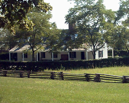 Southern Plantation
Both sides of this house have long wide porches. It is from a 700 acre agricultural plantation operated with 75 slaves. The slaves lived in wooden shacks with dirt floors. 
