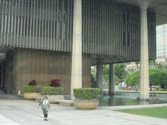This government building is surrounded by water as is the Hawaiian islands

