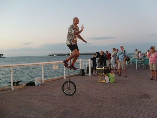 Street performer
This guy was great but the poor guy's show was ruined when dolphins showed up and everyone ran to the rail to watch the dolphins instead.
