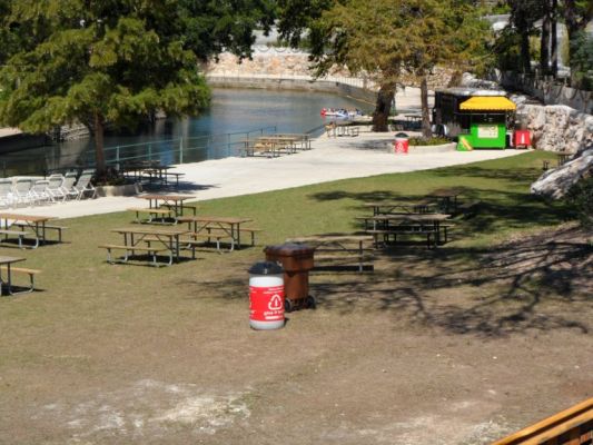 Group picnic area at Schlitterbahn next to the Comal River 
