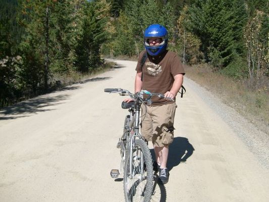 David and I ride the Hiawatha Bike Trail
Part of Rails to Trails, it is mostly downhill so all I really had to do was sit and coast. It has around 10 dark tunnels and 7 high trestles. Bikes can be rented at Lookout Ski Area if you don't have them and you can get a bus pass there to be bussed back to the trailhead. Well worth it! Take water and a lunch. There is a a geocache at the trailhead and one long 10 piece puzzle cache all along the trail to gather the coordinates to a second. We found all.
