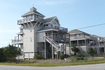 You see a lot of towers, balconies, and widow walks on the houses there.
