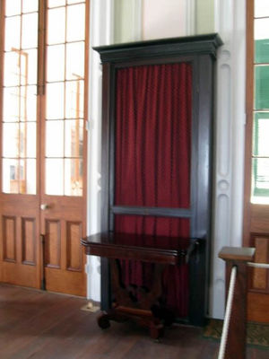 Bookshelf
Jefferson saw this bookshelf at a friend's and had many made for his own home. The books are behind the red velvet.
