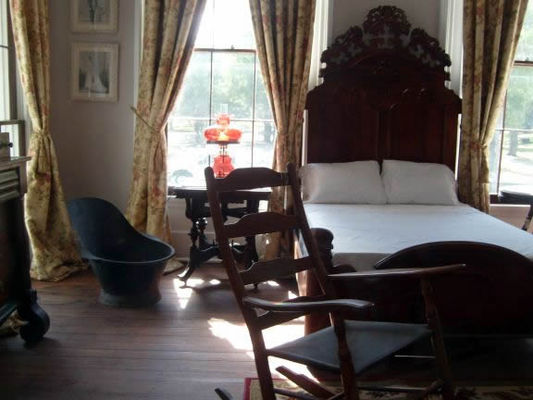 Jefferson's bedroom
He and his wife had separate bedrooms. Us older folks understand why. Can you imagine him trying to bathe in that small tub. While the bedroom is attached to the house, you have to go out on the wide covered back veranda to access the bedroom. This provided more privacy with less noise. As was common in that day, the kitchen is also in a separate building for fire safety and there are a couple of guest houses nearby on the property.
