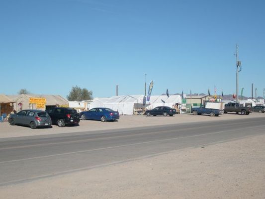 Parking gets much much worse during the show
Beware being shoved out into the wash parking lot on loose sand. Expect a long walk in too.
