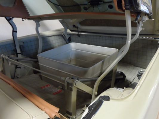 1958 Ford Fairlane 500 Skyliner Retractable Hard Top
It folds back into the huge trunk. The box in the center is for storage of your other items you normally put in the trunk. Very complicated system subject to failures.
