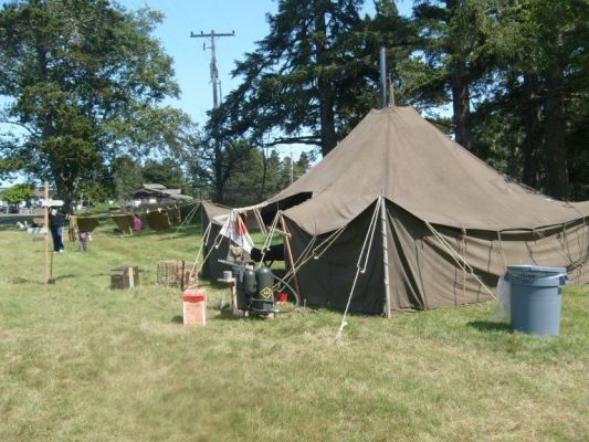 Flame thrower, clean laundry, and sign to point the way to Tokyo
