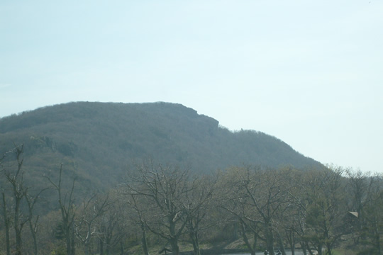 The face
Look to the top right side to see a man's face in the mountain
