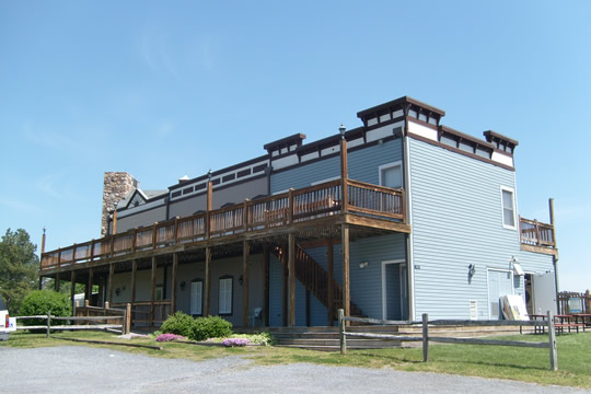 The clubhouse
Inside are game rooms, jacuzzi, snack bar, gym, and above is a most excellent adult only lounge with widescreen TV, living room, and tables.
