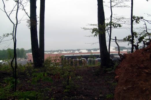 Historic site and geocache right next to a mall
Most shoppers probably don't even notice the signs and path up the hill at one side of the parking lot.
