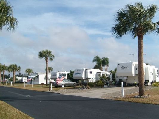 Wauchula SKP RV Park
Lovely park owned by Escapees camping group for their members only. Wide paved roads, cement patios, full hookups, heated pool, clubhouse with plenty of activities, very inexpensive daily rate, and friendly members. Lots of members have long term leases for their sites. Mixture of park models, motorhomes, and trailers. Many folks addon screen rooms for more space and second roofs to protect trailer roofs.
