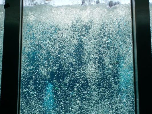 They use bubbles as the curtain between scenes
